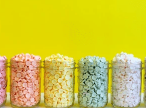 Jars of different colored candy