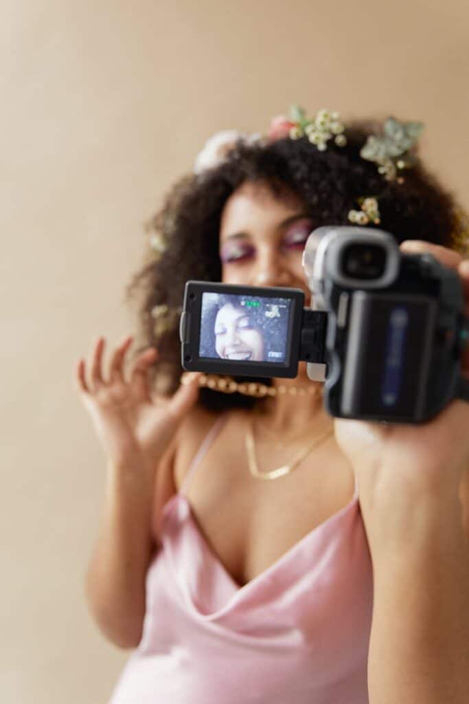 woman being recorded on video