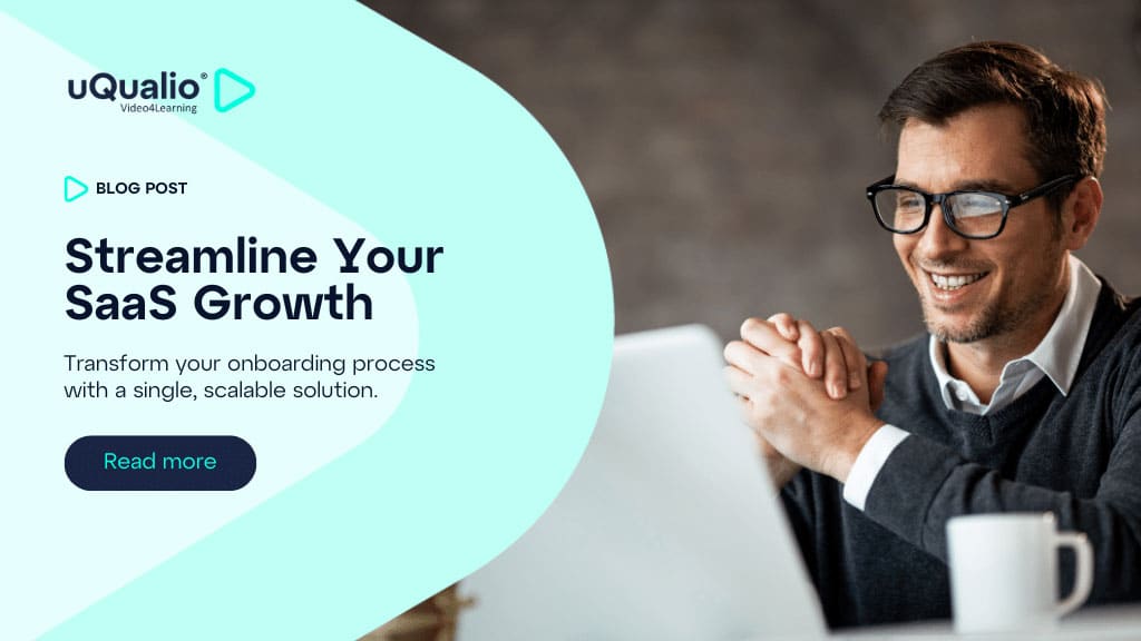 A smiling businessman wearing glasses and a dark sweater over a white shirt, sitting at a desk with a coffee mug, against a turquoise curved design element containing the uQualio logo and blog post title.|Solve SaaS employee scaling and customer onboarding with one video LMS|A smiling businessman wearing glasses and a dark sweater over a white shirt, sitting at a desk with a coffee mug, against a turquoise curved design element containing the uQualio logo and blog post title.