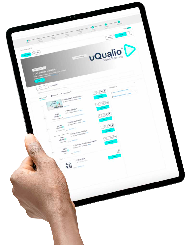 Holding a ipad with uQualio Course onscreen